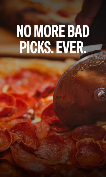 Paywall photo: a pepperoni pizza being sliced.