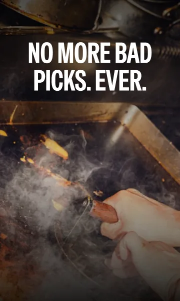 Paywall photo: a chef working a smoking grill.